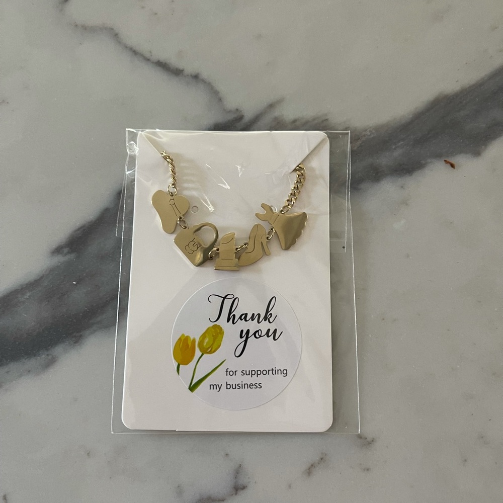 Beautiful Gold Stein steel jewelry. Never used.